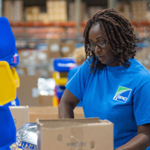ipc employee packing box in warehouse