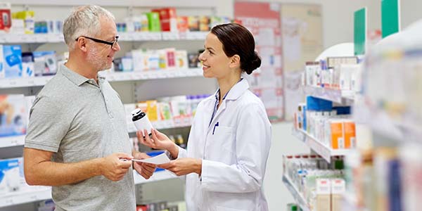 pharmacist helping patient