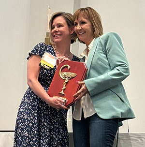 vicki einhellig (right) receives award